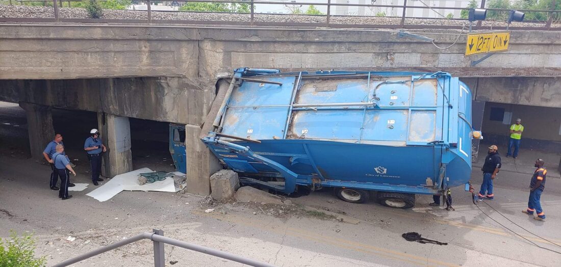 photo-lawrence-trash-truck-gets-wedged-under-bridge-in-kansas-city